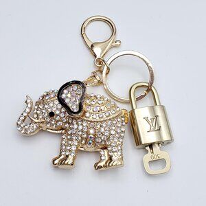 Authentic Louis Vuitton Lock & Key with Unbranded Elephant Charm, Keychain